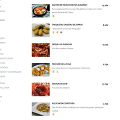 Menu z daniami: jajka z szynką 13,50€, krokiety 8,50€, uszy wieprzowe 9€, ziemniaki 6,75€. Czy w Hiszpanii jest drogo? Ceny sugerują, że można zjeść smacznie i w rozsądnej cenie.