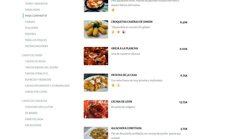 Menu z daniami: jajka z szynką 13,50€, krokiety 8,50€, uszy wieprzowe 9€, ziemniaki 6,75€. Czy w Hiszpanii jest drogo? Ceny sugerują, że można zjeść smacznie i w rozsądnej cenie.